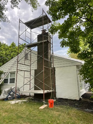 Brick exposed before repair.
