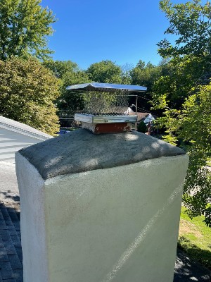 Newly restuccoed chimney.